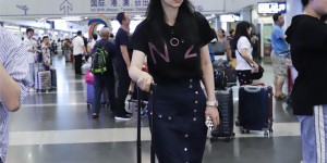 Wearing a navel-baring T-shirt to the airport (it’s a bit embarrassing to have a small belly)