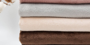 What kind of fabric is good for a nightgown? Do I need to wear clothes under the nightgown?